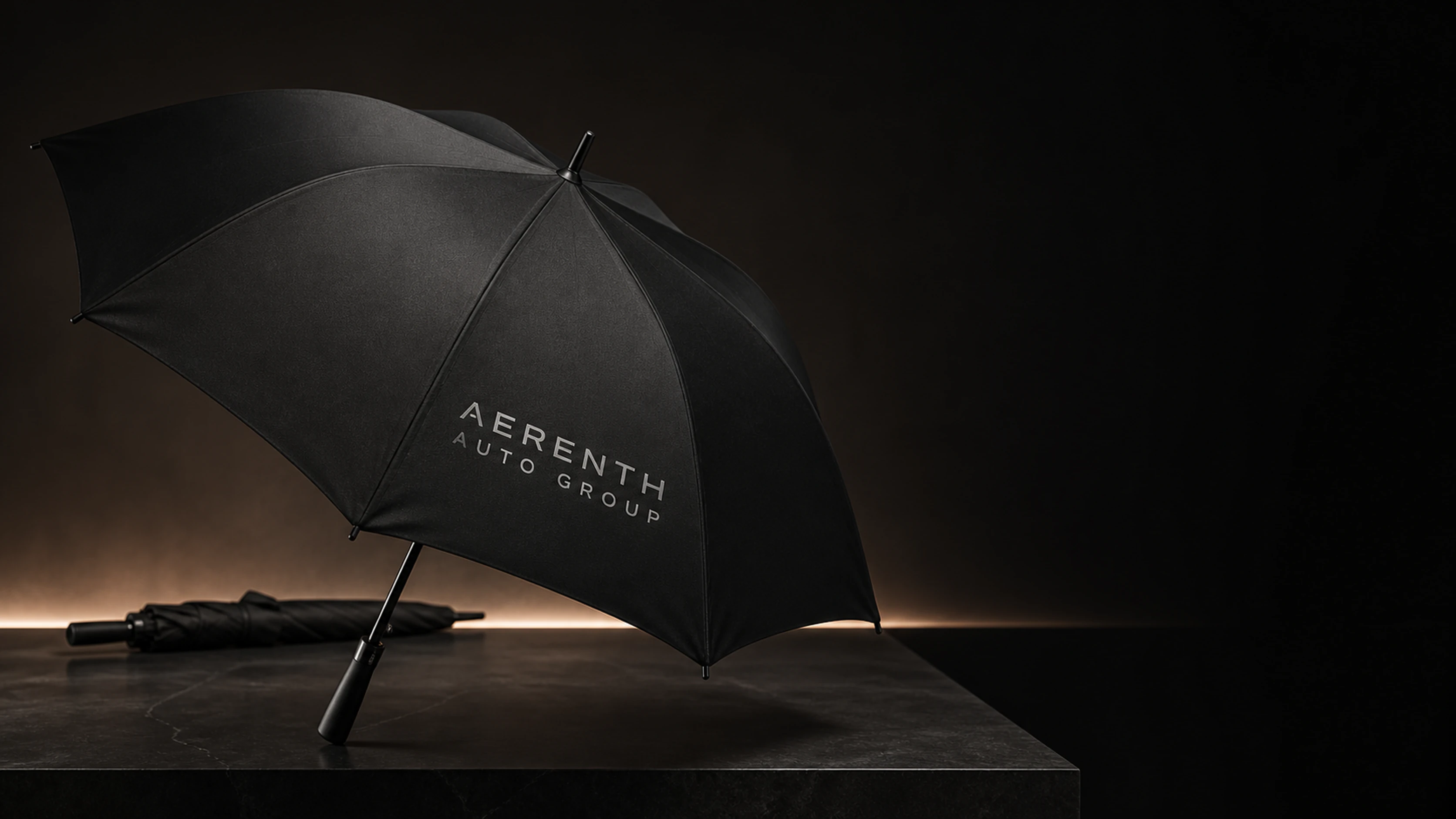 Premium black umbrella branded AERENTH AUTO GROUP